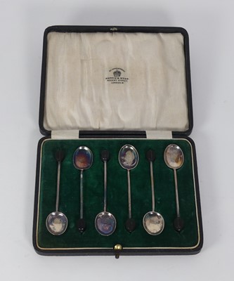 Lot 335 - A set of six George V silver coffee spoons...