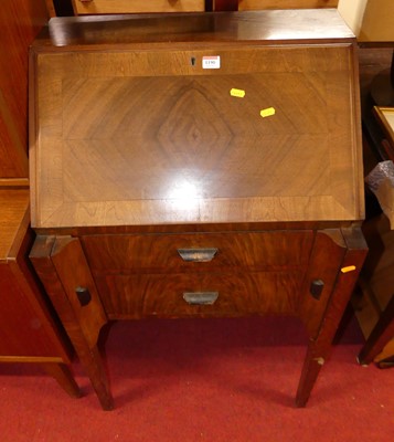 Lot 1190 - An Art Deco figured walnut and crossbanded...