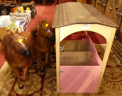 Lot 1424 - An Our Generation Stable with 2 brown horses