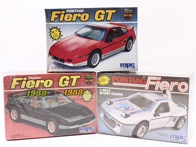 Lot 1594 - M.P.C/ERTL 1.25  Pontiac Fiero kits, 6309 1984...