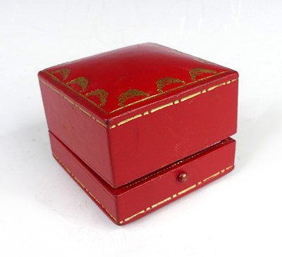 Lot 2804 - A Cartier red leather and gilt tooled ring box,...