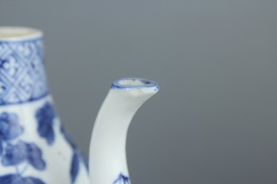 Lot 2 - A Chinese blue and white “dragon” ewer, Qing...