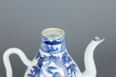 Lot 2 - A Chinese blue and white “dragon” ewer, Qing...