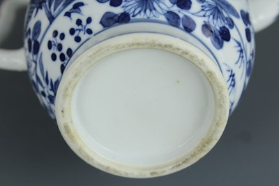 Lot 2 - A Chinese blue and white “dragon” ewer, Qing...