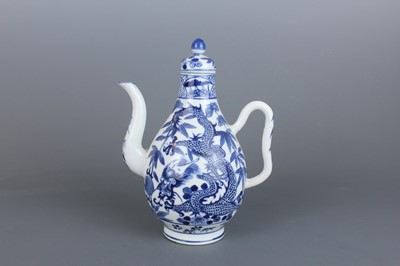 Lot 2 - A Chinese blue and white “dragon” ewer, Qing...
