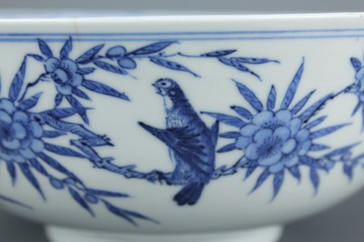 Lot 3 - A Chinese blue and white “magpie and prunus”...