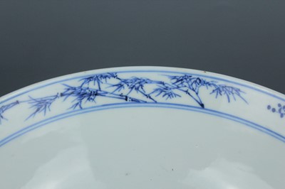 Lot 3 - A Chinese blue and white “magpie and prunus”...
