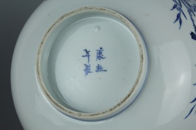 Lot 3 - A Chinese blue and white “magpie and prunus”...