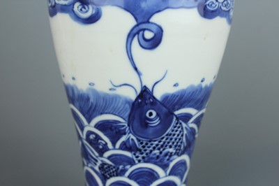 Lot 6 - A Chinese blue and white “fish” baluster vase,...