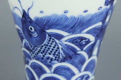 Lot 6 - A Chinese blue and white “fish” baluster vase,...