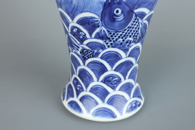 Lot 6 - A Chinese blue and white “fish” baluster vase,...