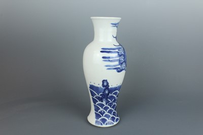 Lot 6 - A Chinese blue and white “fish” baluster vase,...