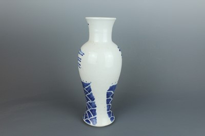 Lot 6 - A Chinese blue and white “fish” baluster vase,...