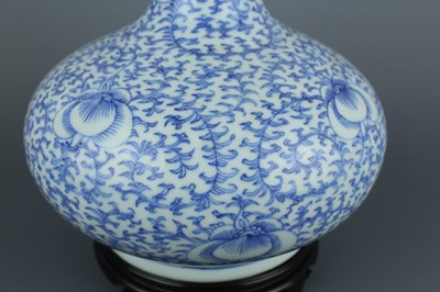 Lot 7 - A Chinese blue and white “scrolling peony”...