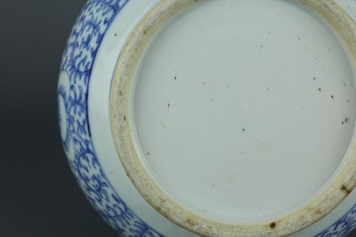 Lot 7 - A Chinese blue and white “scrolling peony”...