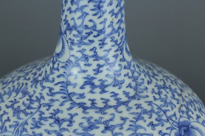 Lot 7 - A Chinese blue and white “scrolling peony”...