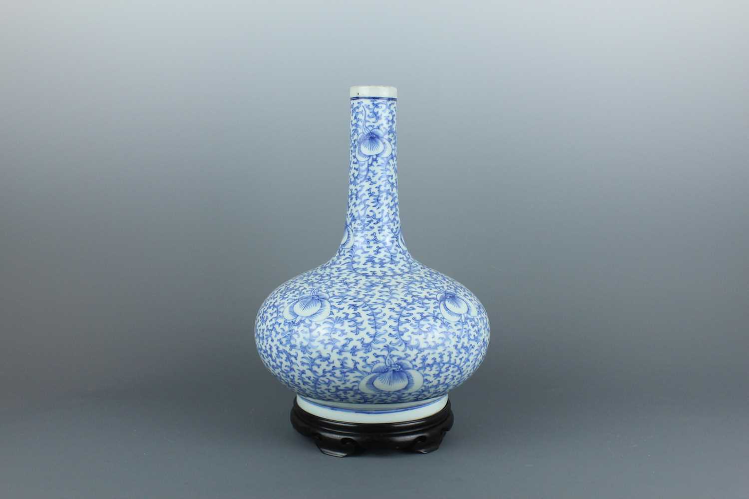 Lot 7 - A Chinese blue and white “scrolling peony”...