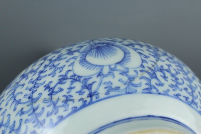 Lot 7 - A Chinese blue and white “scrolling peony”...