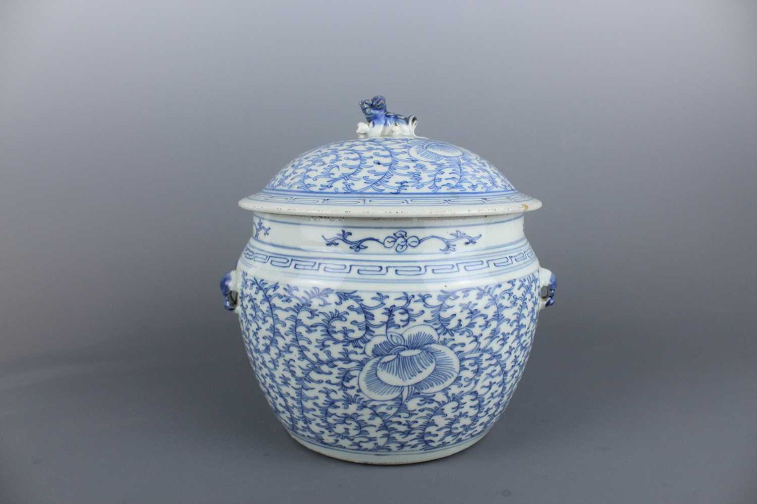 Lot 209 - A Chinese blue and white ”scrolling lotus“ jar...