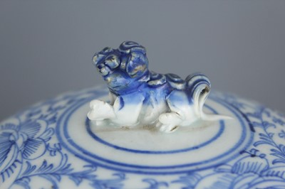 Lot 209 - A Chinese blue and white ”scrolling lotus“ jar...