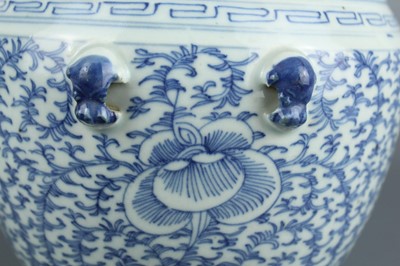 Lot 209 - A Chinese blue and white ”scrolling lotus“ jar...