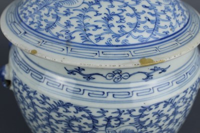Lot 209 - A Chinese blue and white ”scrolling lotus“ jar...