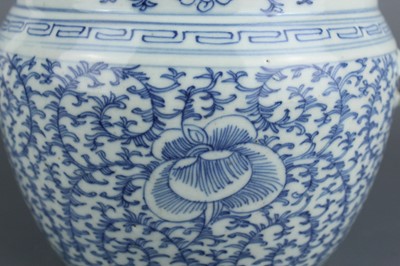 Lot 209 - A Chinese blue and white ”scrolling lotus“ jar...