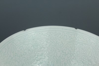 Lot 9 - A Chinese “scrolling lotus” stem bowl and stem...
