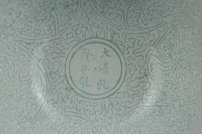 Lot 9 - A Chinese “scrolling lotus” stem bowl and stem...