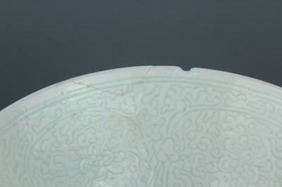 Lot 9 - A Chinese “scrolling lotus” stem bowl and stem...