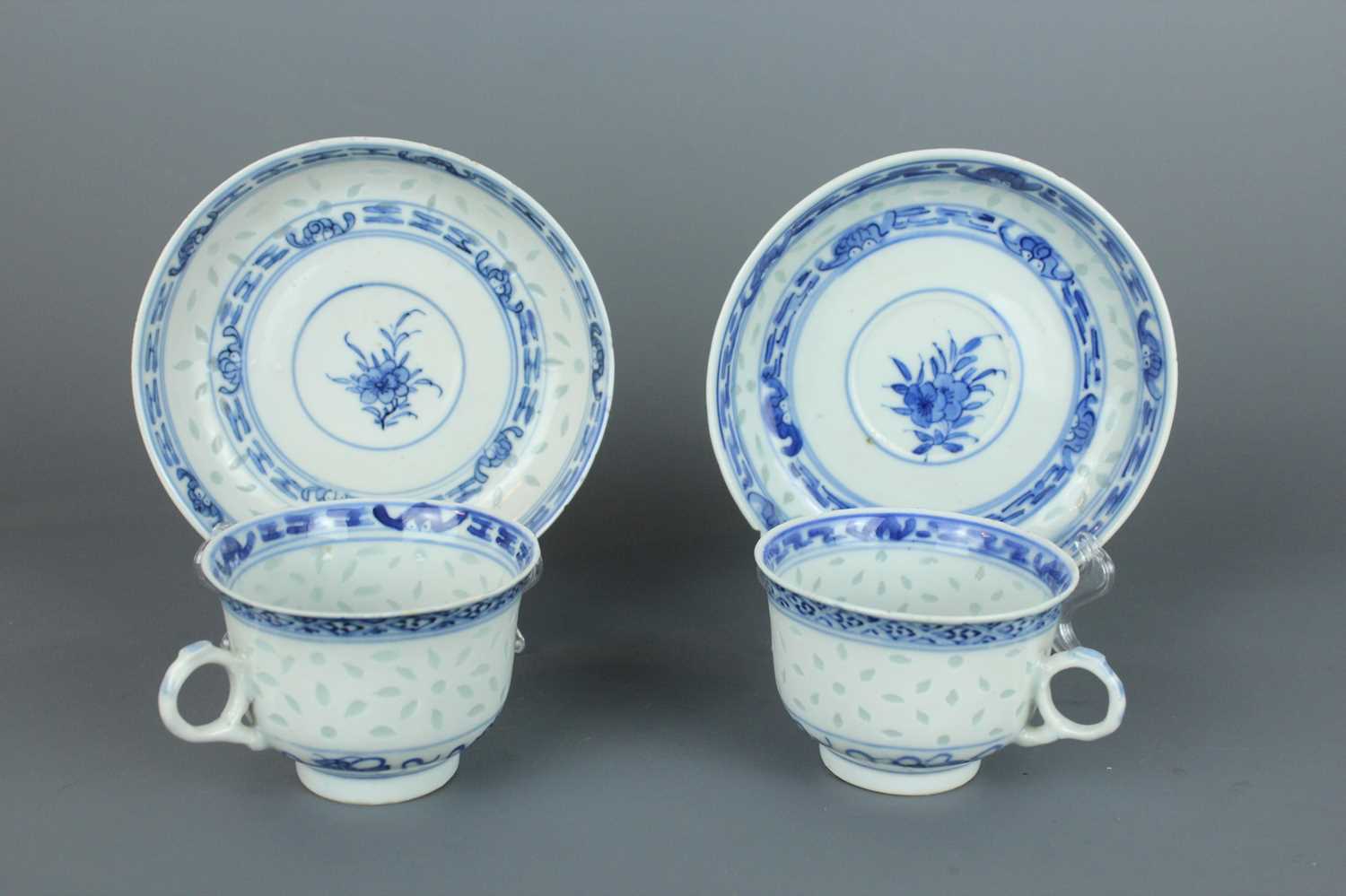 Lot 202 - Two sets of Chinese rice grain pattern teacups...