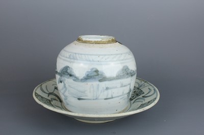 Lot 23 - A Chinese blue and white jar with a matching...