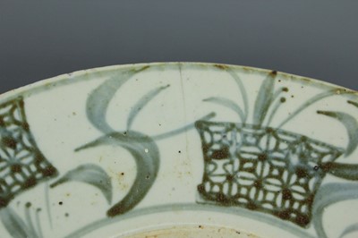 Lot 23 - A Chinese blue and white jar with a matching...