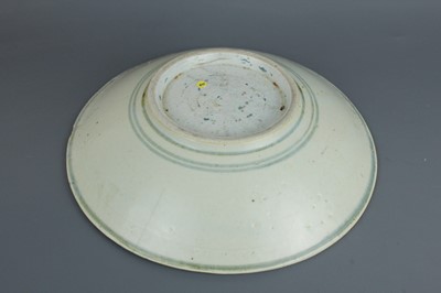 Lot 23 - A Chinese blue and white jar with a matching...
