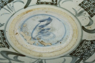 Lot 23 - A Chinese blue and white jar with a matching...