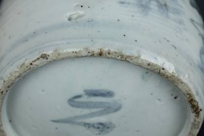 Lot 23 - A Chinese blue and white jar with a matching...