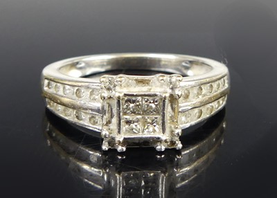 Lot 2822 - A modern 18ct white gold and diamond set dress...