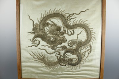 Lot 45 - An imposing embroidered “dragon” silk panel in...