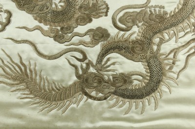 Lot 45 - An imposing embroidered “dragon” silk panel in...