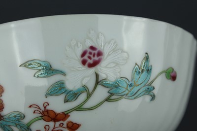 Lot 74 - A Chinese famille rose ”garden and flowers”...