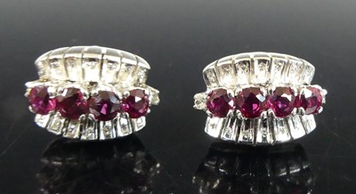 Lot 447 - A pair of white metal ruby and diamond...