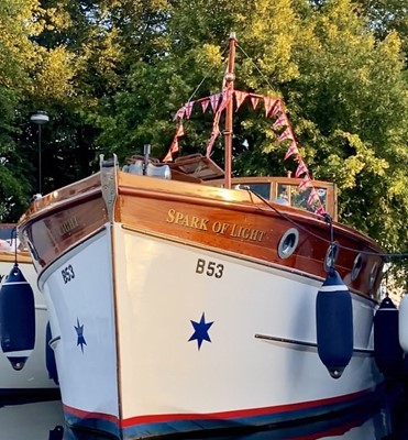 Lot 24 - Spark of Light: Old World Style Boating...