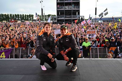 Lot 25 - Lot 25 
McLaren F1 Cap & Shirt signed by Lando...