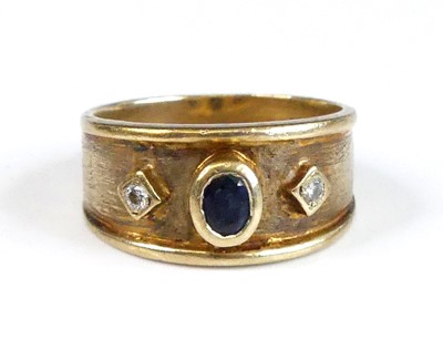 Lot 2967 - A contemporary 18ct gold, sapphire and diamond...