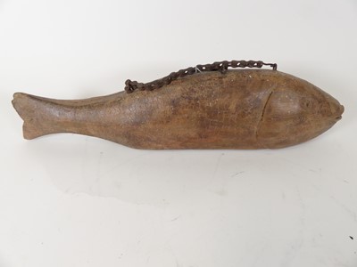 Lot 38 - A carved hardwood carry case in the form of a...