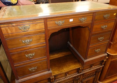 Lot 1185 - A late Victorian walnut gilt tooled green...