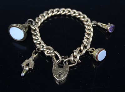 Lot 389 - A 9ct gold curblink hollow bracelet, with...