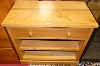 Lot 1243 - A contemporary blond oak low side cupboard,...