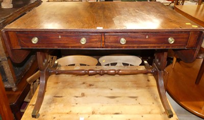 Lot 1182 - A 19th century mahogany sofa table, having...