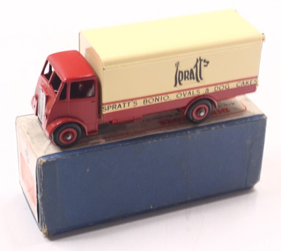 Lot 1106 - Dinky Toys, 514 Guy van 'Spratts', red and...